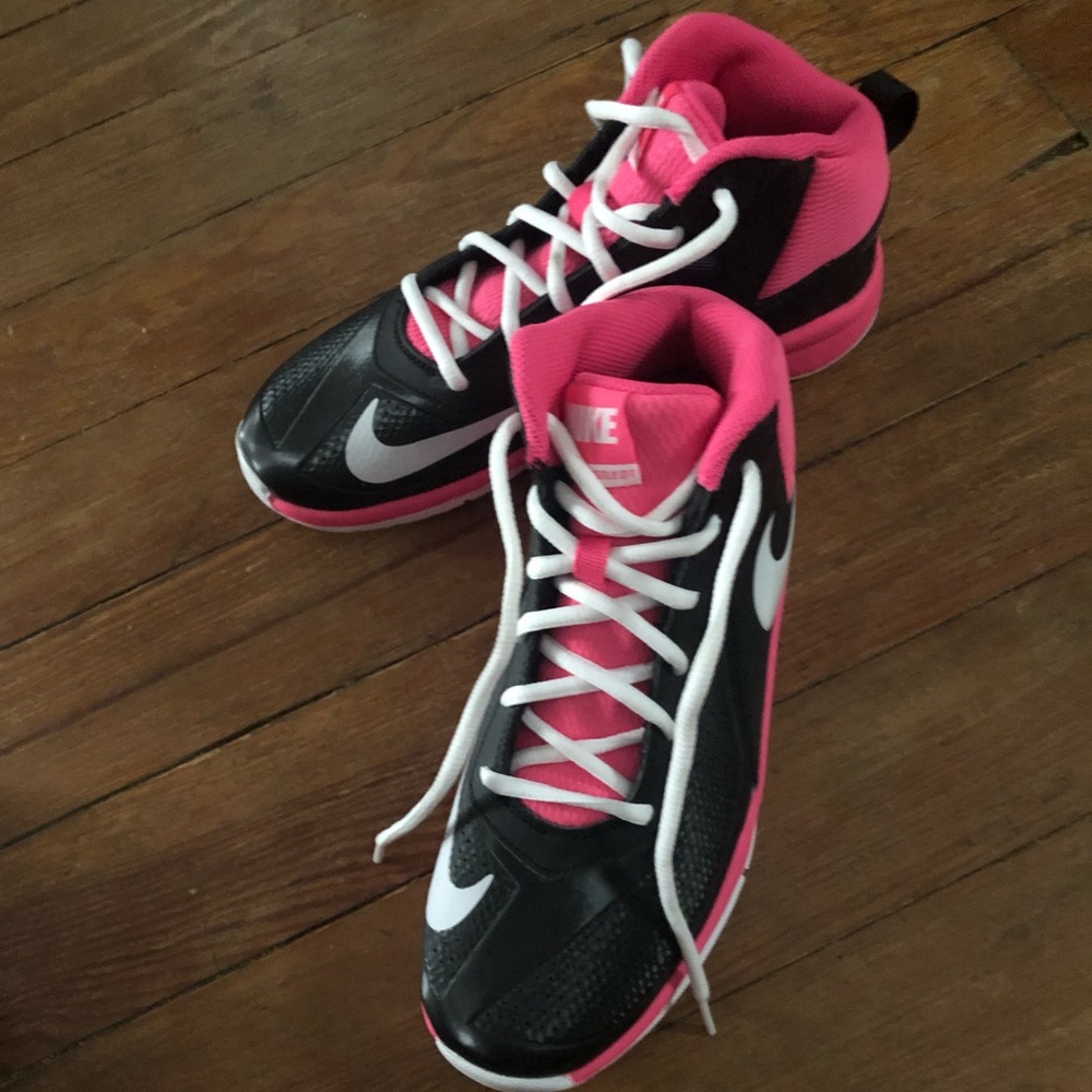 Pink black and white nike shoes